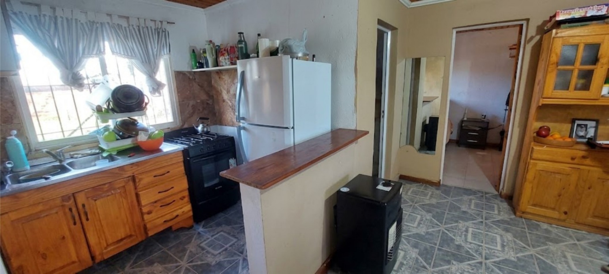 OPORTUNIDAD - CASA CON DOS DORMITORIOS + PATIO